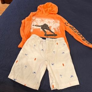 Boys surfer/scary outfit . Long sleeve light cotton shirt and white khaki shorts